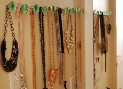jewelry on knobs right on wall