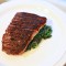 Sauteed Skin-On Herb Salmon over Creamed Spinach - $2.95